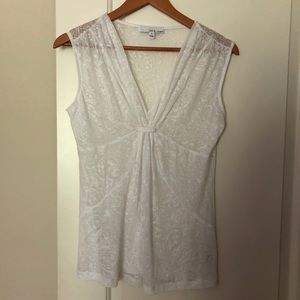 Lucy & Laurel sheer white sleeveless top.